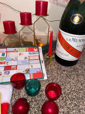 CHRISTMAS DECORATIONS, ALONG WITH THE BIGGEST CHAMPAGNE BOTTLE WE’VE EVER SEEN!