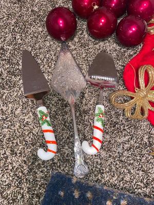 CHRISTMAS DECORATIONS, ALONG WITH THE BIGGEST CHAMPAGNE BOTTLE WE’VE EVER SEEN!