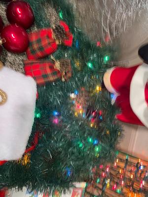CHRISTMAS DECORATIONS, ALONG WITH THE BIGGEST CHAMPAGNE BOTTLE WE’VE EVER SEEN!