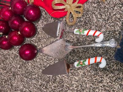 CHRISTMAS DECORATIONS, ALONG WITH THE BIGGEST CHAMPAGNE BOTTLE WE’VE EVER SEEN!