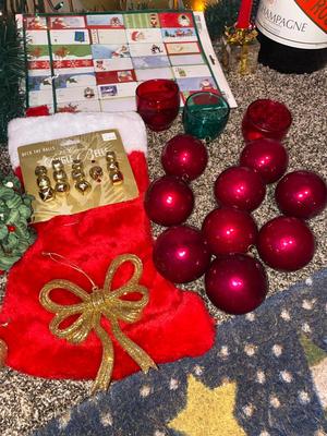 CHRISTMAS DECORATIONS, ALONG WITH THE BIGGEST CHAMPAGNE BOTTLE WE’VE EVER SEEN!