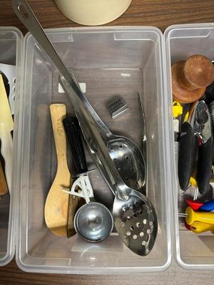 KITCHEN UTENSILS AND A CROCK LIKE HOLDER