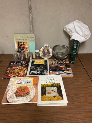 VARIETY OF COOKBOOK’S, A CHEF’S HAT AND KITCHEN GADGETS