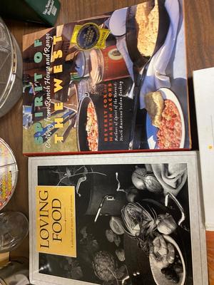 VARIETY OF COOKBOOK’S, A CHEF’S HAT AND KITCHEN GADGETS