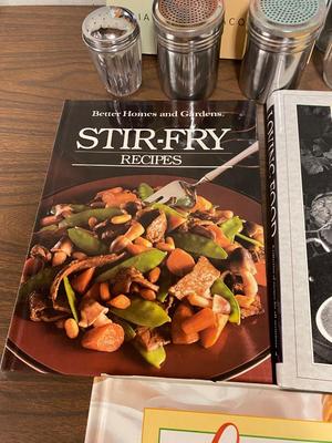 VARIETY OF COOKBOOK’S, A CHEF’S HAT AND KITCHEN GADGETS