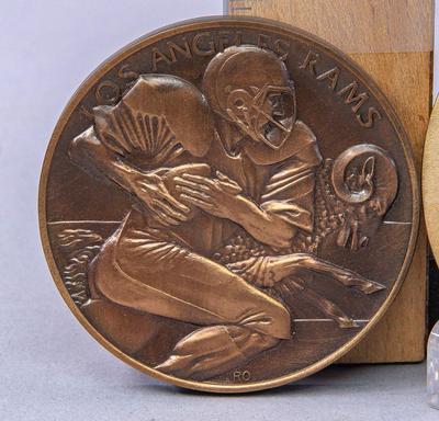 SPORTS TOKENS - RAMS AND ARNOLD PALMER