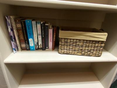 LINED WICKER BASKET, AND A VARIETY OF READING MATERIAL