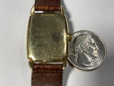 Vintage Lord Elgin Preowned 14k Gold Filled Wristwatch (Overwound Needs Repair & Needs a New Band) Cosmetically VG Condition.