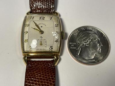 Vintage Lord Elgin Preowned 14k Gold Filled Wristwatch (Overwound Needs Repair & Needs a New Band) Cosmetically VG Condition.