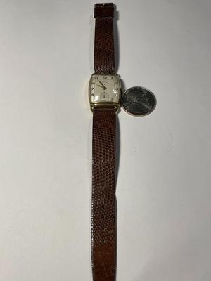 Vintage Lord Elgin Preowned 14k Gold Filled Wristwatch (Overwound Needs Repair & Needs a New Band) Cosmetically VG Condition.