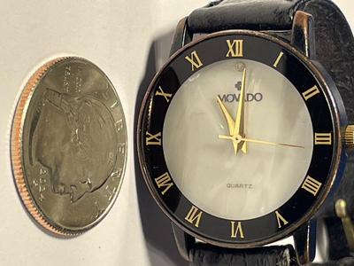 Vintage MOVADO Preowned Mother of Pearl Face Wristwatch (Needs Battery & Needs a New Band) Cosmetically Good Condition.