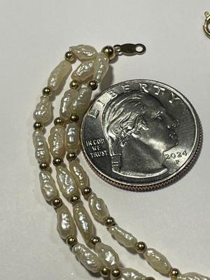Vintage Preowned 14k Freshwater Pearl Triple Strand 6.5" Bracelet in Good Condition as Pictured. FREE DOMESTIC SHIPPING.