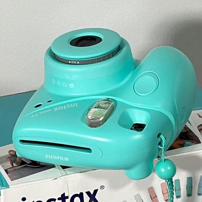 LOT 84L: Fujifilm Instax Mini 7+ Instant Camera w/ Original Box and Accessories