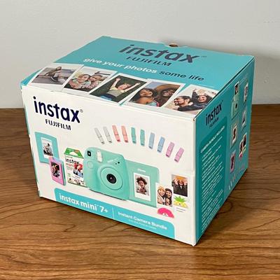 LOT 84L: Fujifilm Instax Mini 7+ Instant Camera w/ Original Box and Accessories