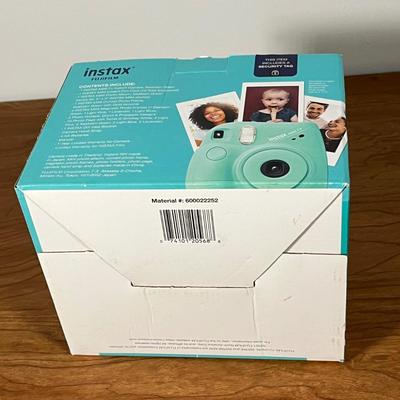 LOT 84L: Fujifilm Instax Mini 7+ Instant Camera w/ Original Box and Accessories
