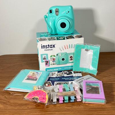 LOT 84L: Fujifilm Instax Mini 7+ Instant Camera w/ Original Box and Accessories