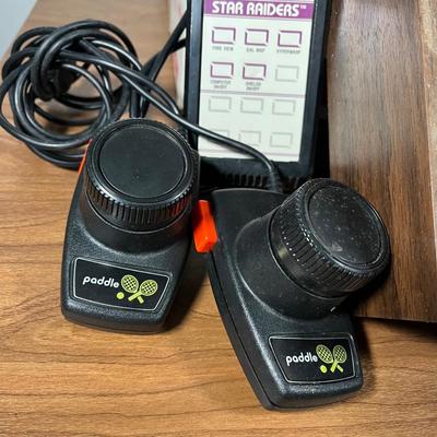 LOT 85L: Vintage Atari 2600 Console, Controller, Paddles and Games in Case