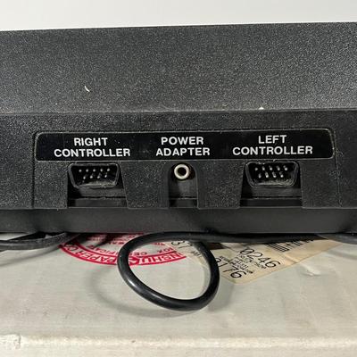 LOT 85L: Vintage Atari 2600 Console, Controller, Paddles and Games in Case