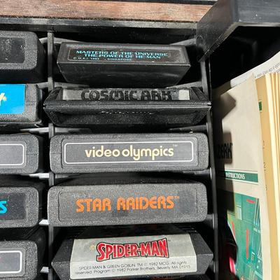 LOT 85L: Vintage Atari 2600 Console, Controller, Paddles and Games in Case