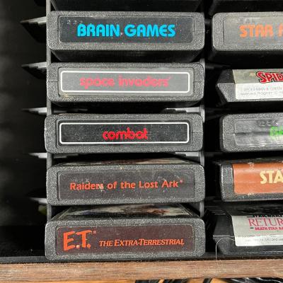 LOT 85L: Vintage Atari 2600 Console, Controller, Paddles and Games in Case