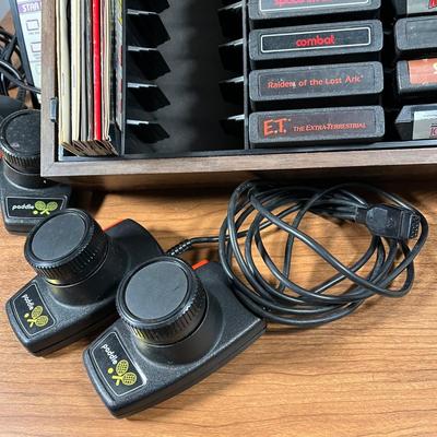 LOT 85L: Vintage Atari 2600 Console, Controller, Paddles and Games in Case