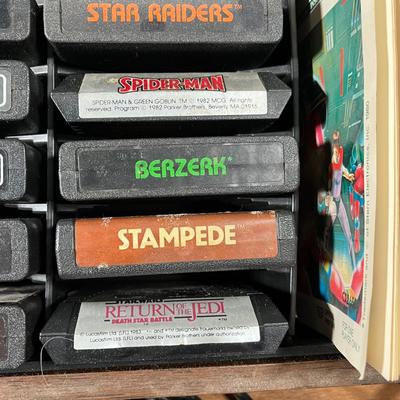 LOT 85L: Vintage Atari 2600 Console, Controller, Paddles and Games in Case