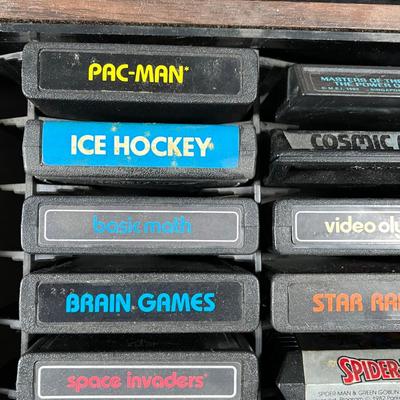 LOT 85L: Vintage Atari 2600 Console, Controller, Paddles and Games in Case