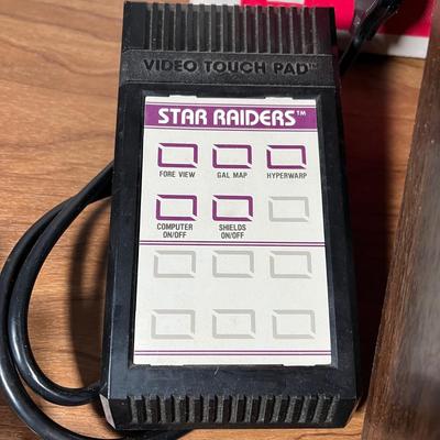 LOT 85L: Vintage Atari 2600 Console, Controller, Paddles and Games in Case