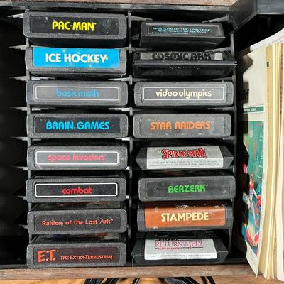 LOT 85L: Vintage Atari 2600 Console, Controller, Paddles and Games in Case