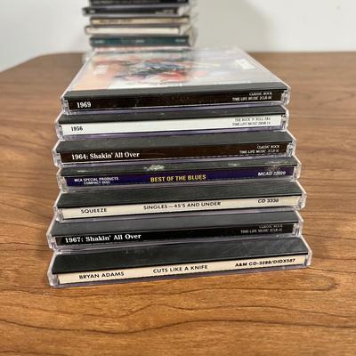 LOT 92L: Big Collection of CDs - Nirvana, The Cars, Madonna, Billy Joel, Janet Jackson, Christmas, and More
