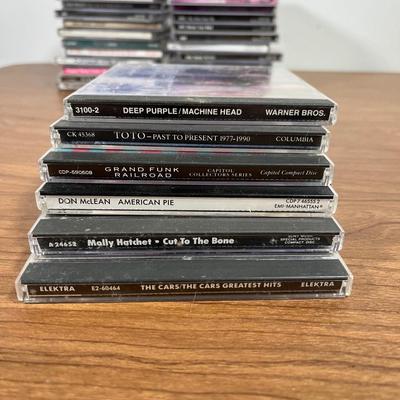 LOT 92L: Big Collection of CDs - Nirvana, The Cars, Madonna, Billy Joel, Janet Jackson, Christmas, and More