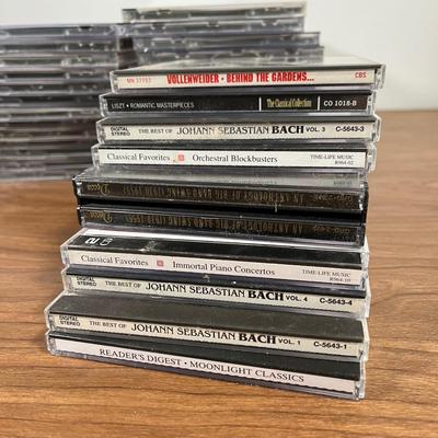 LOT 92L: Big Collection of CDs - Nirvana, The Cars, Madonna, Billy Joel, Janet Jackson, Christmas, and More