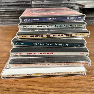 LOT 92L: Big Collection of CDs - Nirvana, The Cars, Madonna, Billy Joel, Janet Jackson, Christmas, and More