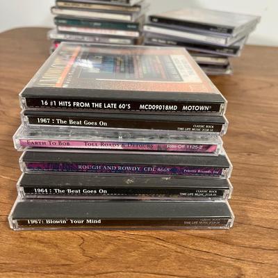 LOT 92L: Big Collection of CDs - Nirvana, The Cars, Madonna, Billy Joel, Janet Jackson, Christmas, and More