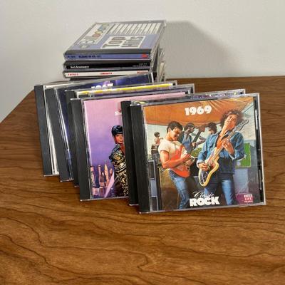 LOT 92L: Big Collection of CDs - Nirvana, The Cars, Madonna, Billy Joel, Janet Jackson, Christmas, and More