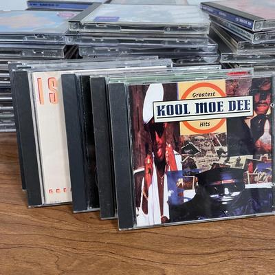 LOT 92L: Big Collection of CDs - Nirvana, The Cars, Madonna, Billy Joel, Janet Jackson, Christmas, and More