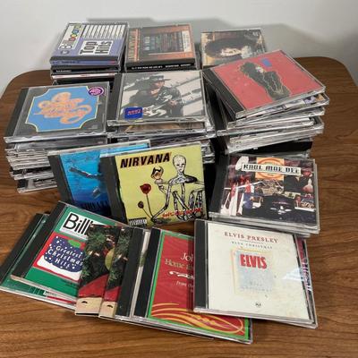 LOT 92L: Big Collection of CDs - Nirvana, The Cars, Madonna, Billy Joel, Janet Jackson, Christmas, and More