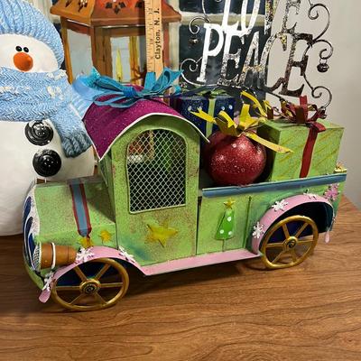 LOT 95L: Christmas Decorations - Metal Truck, Ceramic Snowman, LED Light-Up Picture and More