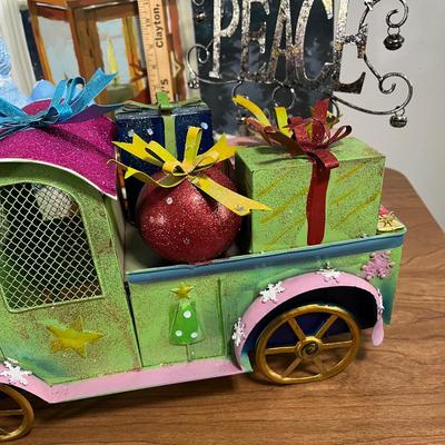 LOT 95L: Christmas Decorations - Metal Truck, Ceramic Snowman, LED Light-Up Picture and More