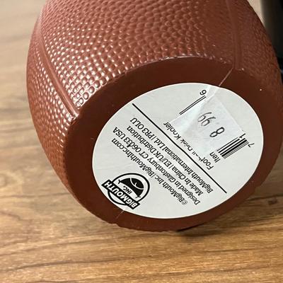 LOT 100L: Football Themed Home Decor, Party Essentials, Serving Pieces, Football-Shaped Crockpot and More