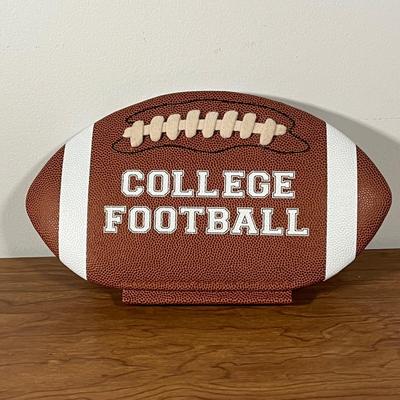 LOT 100L: Football Themed Home Decor, Party Essentials, Serving Pieces, Football-Shaped Crockpot and More