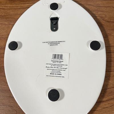 LOT 100L: Football Themed Home Decor, Party Essentials, Serving Pieces, Football-Shaped Crockpot and More