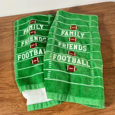 LOT 100L: Football Themed Home Decor, Party Essentials, Serving Pieces, Football-Shaped Crockpot and More