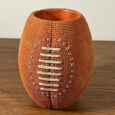 LOT 100L: Football Themed Home Decor, Party Essentials, Serving Pieces, Football-Shaped Crockpot and More