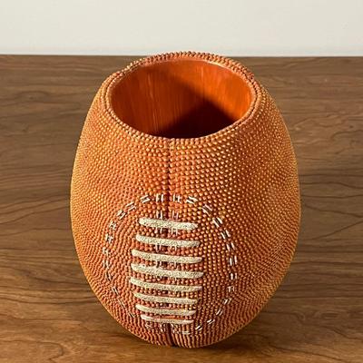 LOT 100L: Football Themed Home Decor, Party Essentials, Serving Pieces, Football-Shaped Crockpot and More