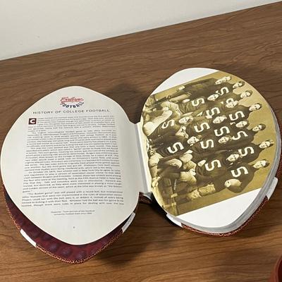 LOT 100L: Football Themed Home Decor, Party Essentials, Serving Pieces, Football-Shaped Crockpot and More