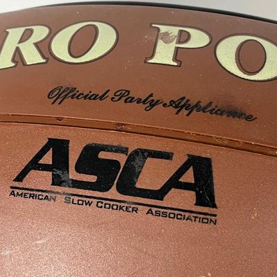 LOT 100L: Football Themed Home Decor, Party Essentials, Serving Pieces, Football-Shaped Crockpot and More