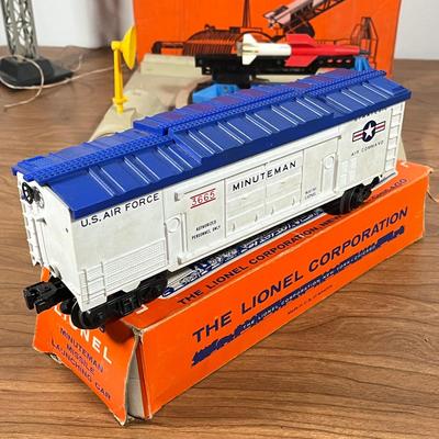 LOT 117L: Collection of Vintage Lionel Trains - Missile Launching Platform and Train Car, Exploding Ammunition Dump and More