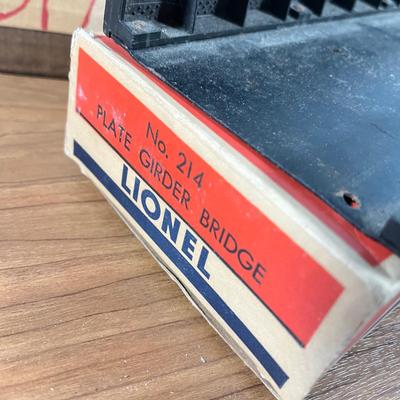 LOT 117L: Collection of Vintage Lionel Trains - Missile Launching Platform and Train Car, Exploding Ammunition Dump and More