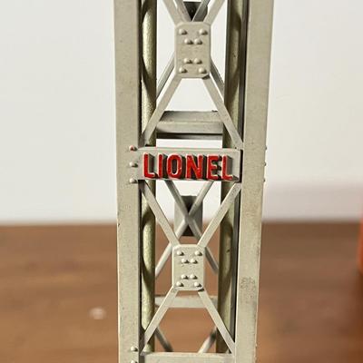 LOT 117L: Collection of Vintage Lionel Trains - Missile Launching Platform and Train Car, Exploding Ammunition Dump and More